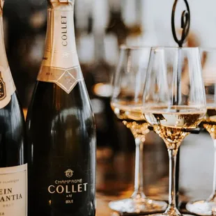 bottles of wine and glasses of wine