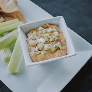 Traditional, Basil Pesto and Lemon Beet Hummus Served with Carrots, Celery, Cherry Tomatoes and Pita Chips