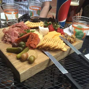 Meat and cheese plate out in the patio. What a beautiful plate!