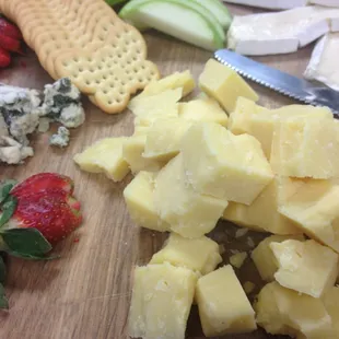 Fresh fruit accompanies the cheeses on their cheese board. Delicious.