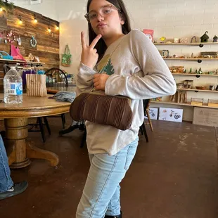 My daughter rocking her purse! She's not usually a purse girl. She loves little backpacks but she had to have it.