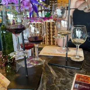 a man drinking a glass of wine