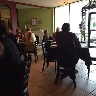 a group of people sitting at a table