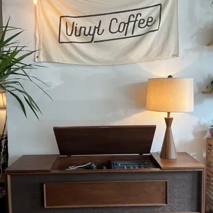 a record player on a coffee table
