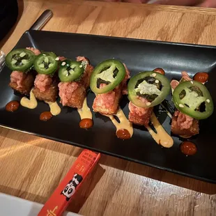 Crispy sushi ($23) - crispy rice, ahi tuna, jalapeno, spicy mayo, sirracha, soy reduction, nori