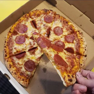 a slice of pepperoni pizza