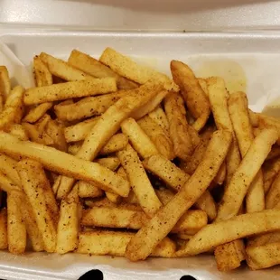 Pepperoni pizza and old bay fries! Delicious!