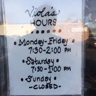 The Hours Posted on the front door