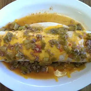 The burrito ranchero. Smothered green chili breakfast burrito.