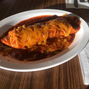 Burrito rancheros with red chili