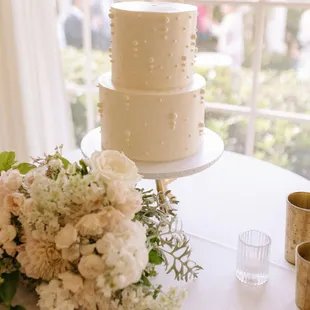 pearls on wedding cake, florals in foreground La Jolla wedding venues