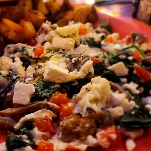 Fetta Me Betta Scramble - Egg whites scrambled with spinach, mushrooms, red bell pepper, turkey sausage, feta cheese, and everything spice.