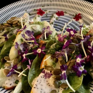 a plate with a salad on it