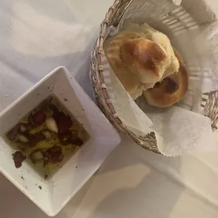 Complementary basket of rolls and oil