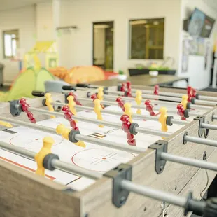 We have a foosball table, pool table and hockey table.