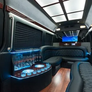 Interior of the Mercedes Sprinter limo with seating for 12 people.