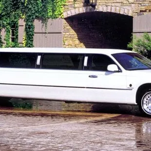 The classic Lincoln Town Car Executive Stretch limo available in white or black.