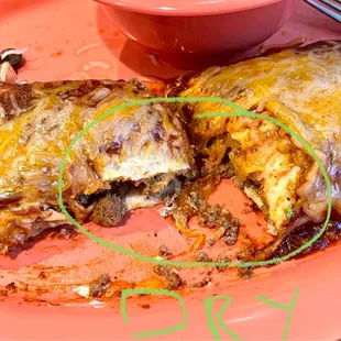 Wet burrito was actually quite dry. Sauce on top was minimal and meat inside was dry &amp; crumbly.