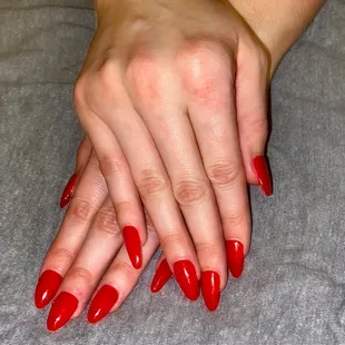 Acrylic, red gel polish, almond tip by Mr. Kevin