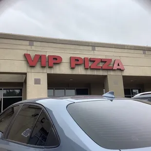 VIP pizza me taking a picture