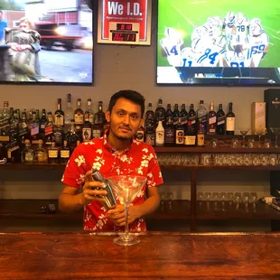 a man holding a drink