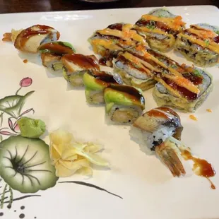 I believe the one with Avocado is the dragon roll and the 5 rolls laying down is the Oconomowoc roll!