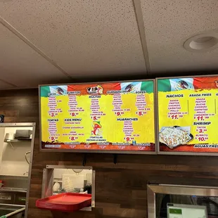 menus on the wall of the restaurant