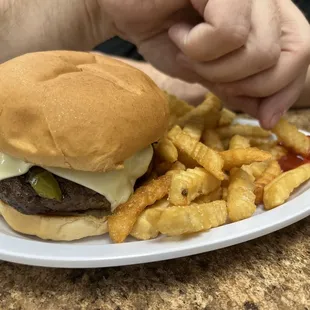 Mushroom Swiss burger with fries