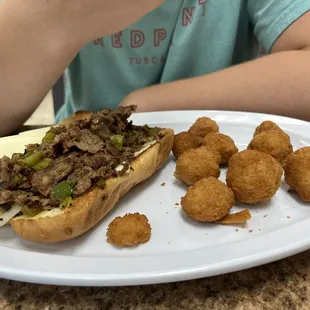 Philly cheesesteak with fried mushrooms