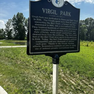 Signage with memorial dedication to The Virgil Family who did so much to make this park and trails a reality