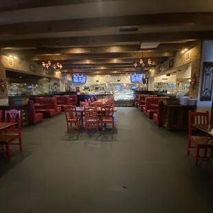 This is the main dining room with kitchen at the back.