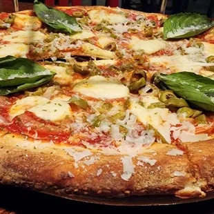 Margarita pizza with green olives