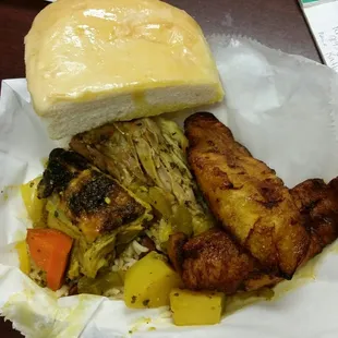 Curry Chicken, Plantains, Coco Bread.....all of it very flavorful and amazing