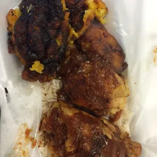 Jerkaque Chicken served with rice and beans and sweet plantains