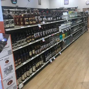 a liquor aisle in a grocery store