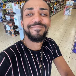 a selfie of a man in a store