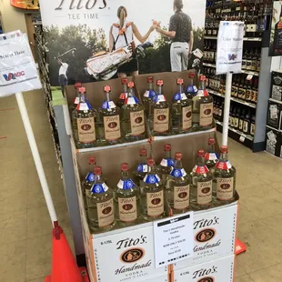 a display of titos bottles