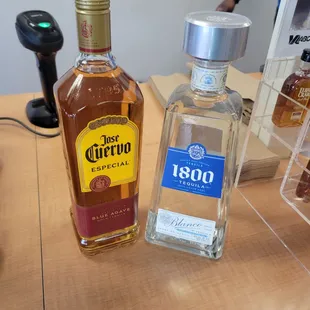 a bottle of liquor and a bottle of liquor