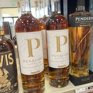 a variety of bottles of whiskey