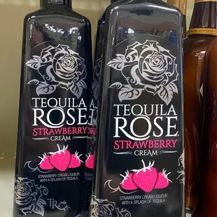 bottles of tequila rose and strawberry syrup
