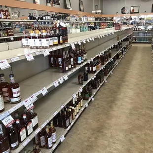 Empty shelves of bourbon