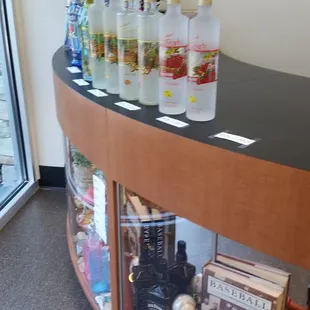 a display of liquor bottles on a shelf