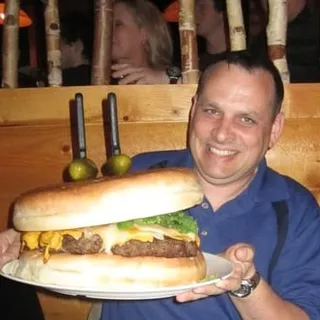 Mark E.