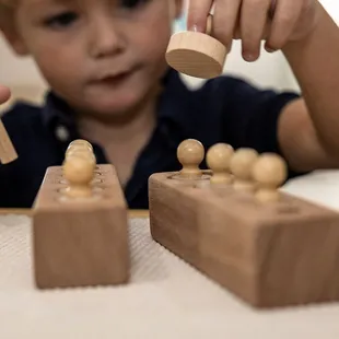 We develop early literacy skills through the letter of the week, reading with them and exploring books on their own.