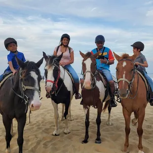 You then give the guide your mobile device to take photos of your party