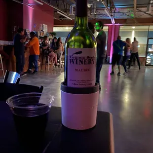 a bottle of wine on a table