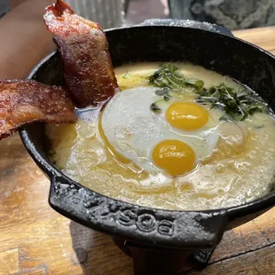 Quail egg and bacon fondue