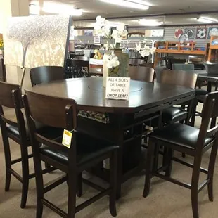 This counter height dinette set has drop leaves on all 4 sides