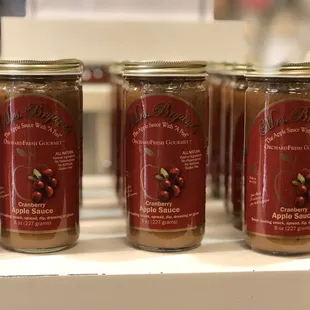 a row of jars of preserves