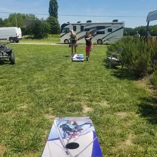 Corn hole while waiting our turn to fly